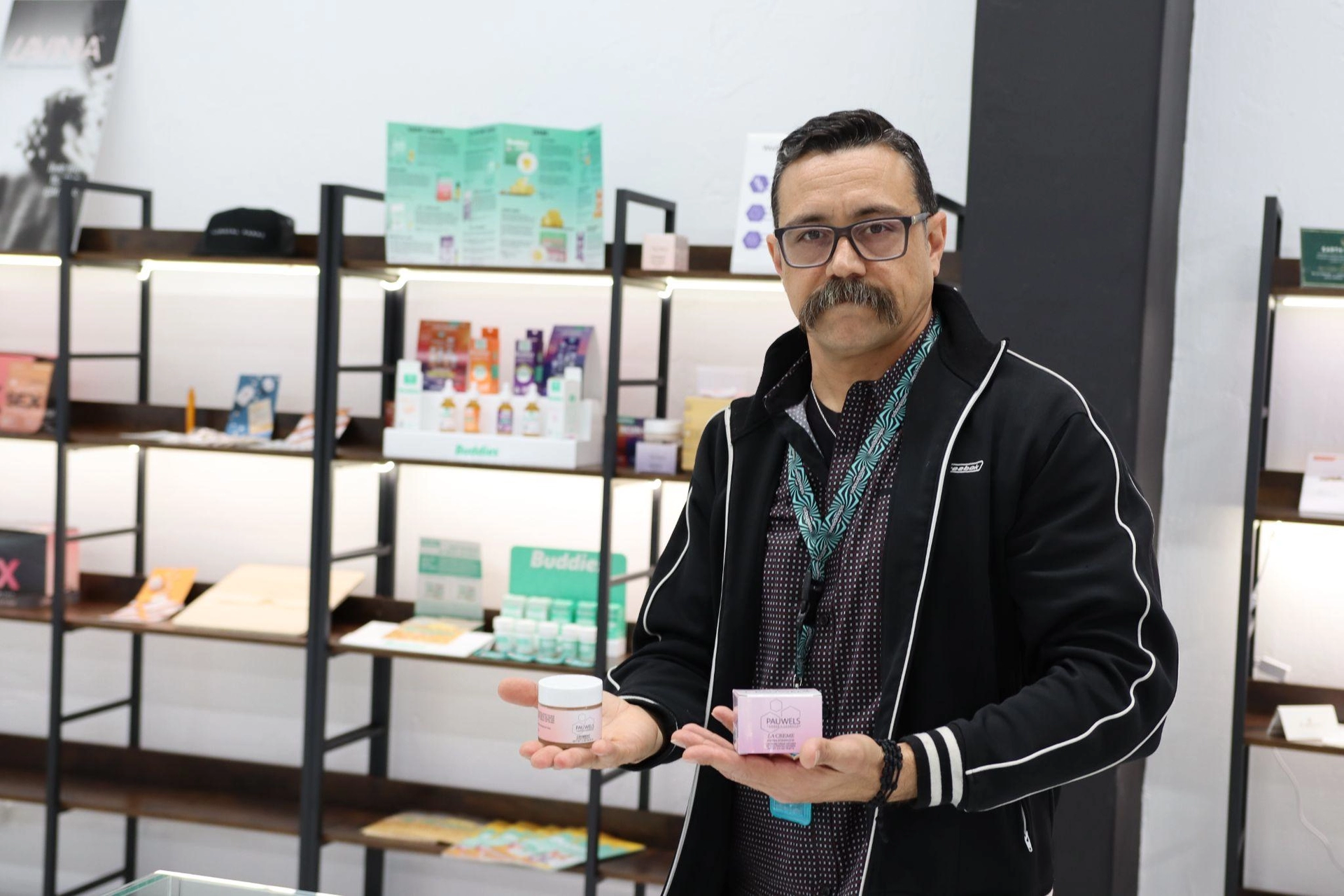 David Pauwels in his Miracle Mile store holding Pauwels Cannabis Cosmetics